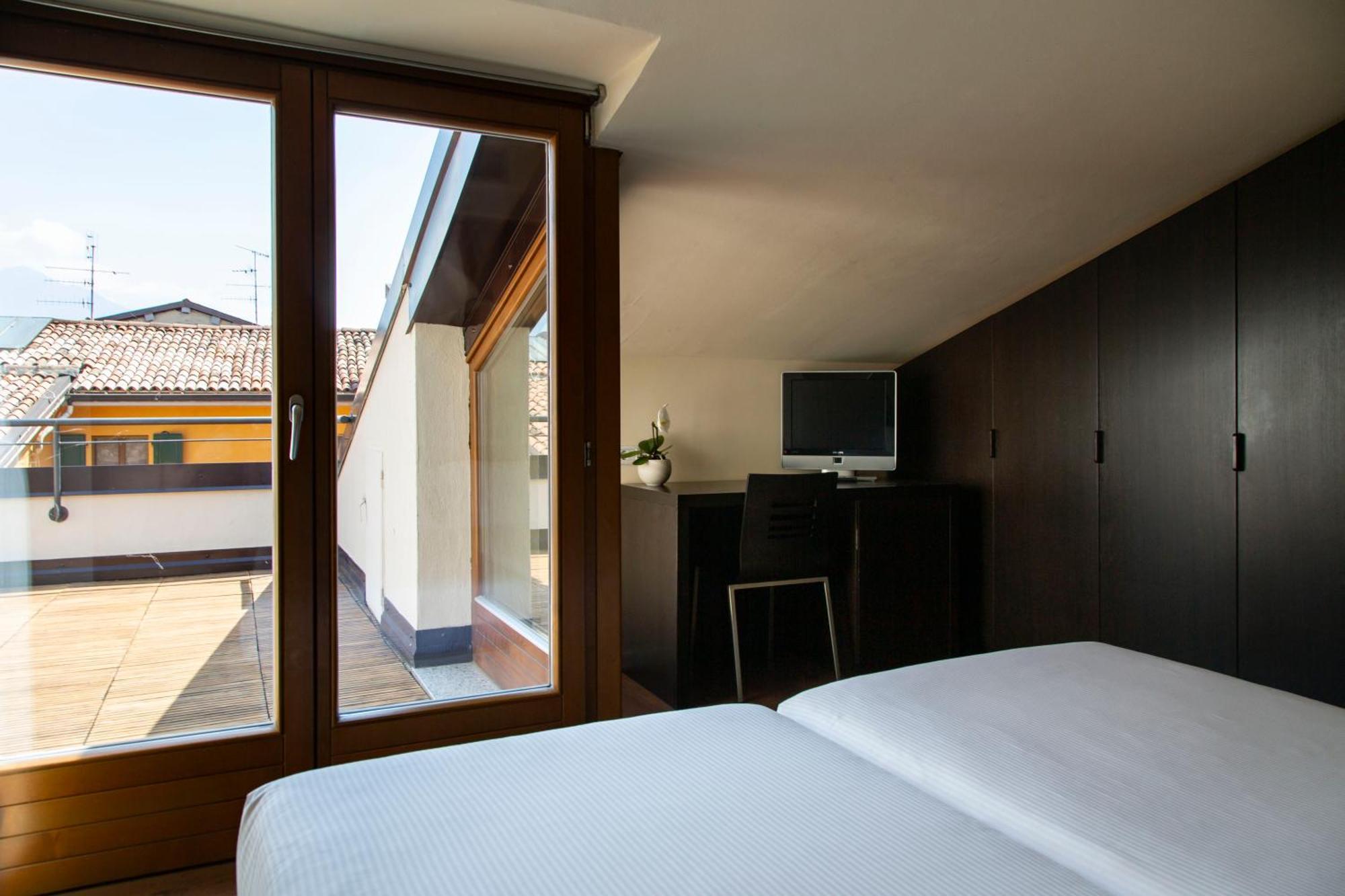 Hotel Antico Borgo Riva del Garda Rum bild